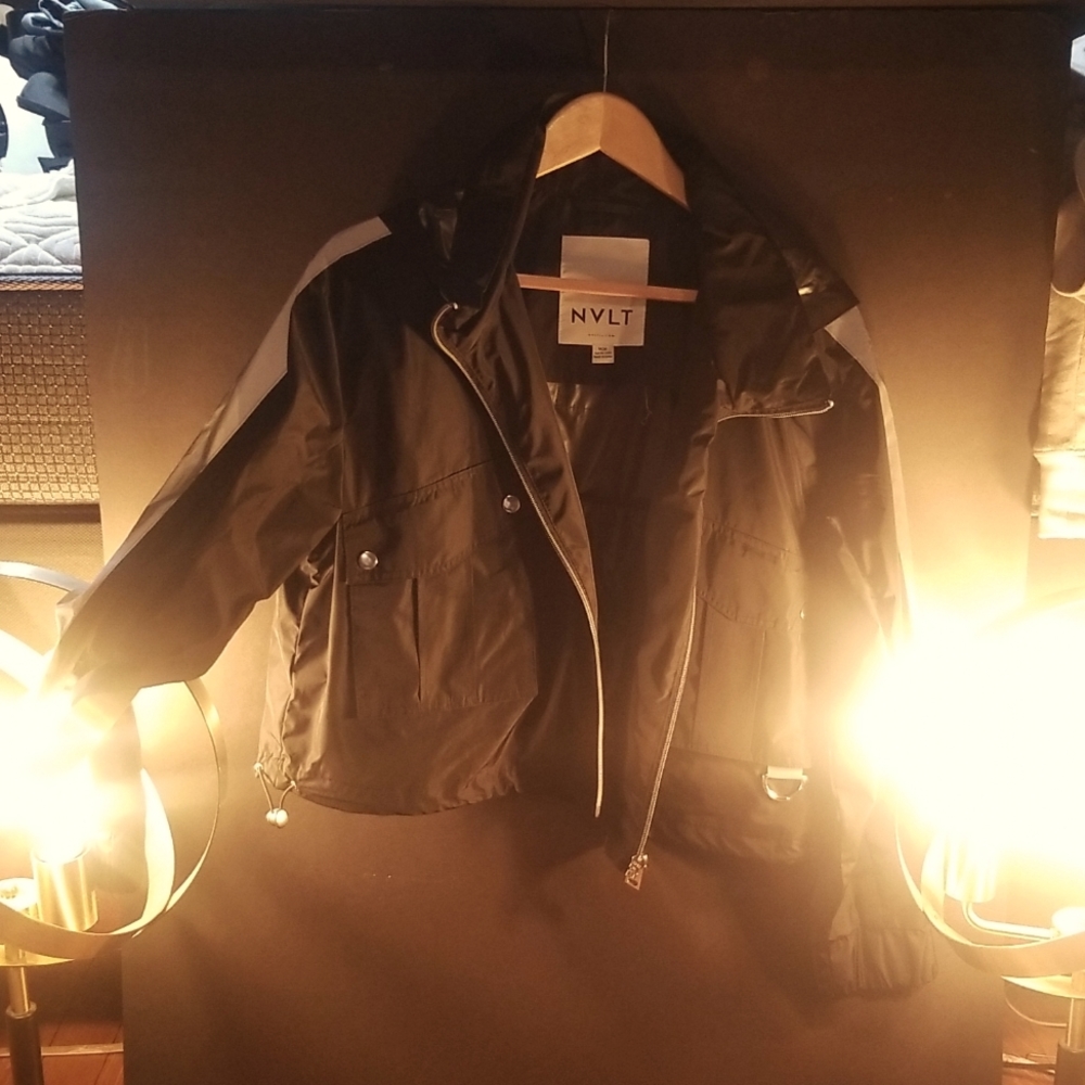 NVLT black windbreaker with silver stripe